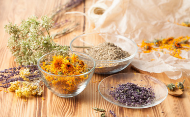 Calendula flowers at home recipes on the wooden table
