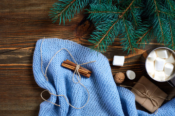 Christmas drink. Mug hot coffee with marshmallow on the wooden background. New Year.
