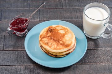 Small pancakes on a blue plate