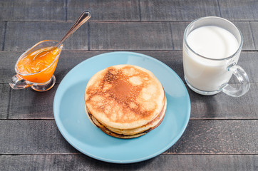 Small pancakes on a blue plate