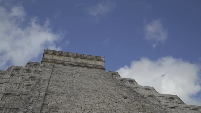 CHICHEN ITZA, MEXICO - MAY 25, 2017: Top of Maya pyramid temple Kukulkan in peninsula Yucatan at sunny summer day