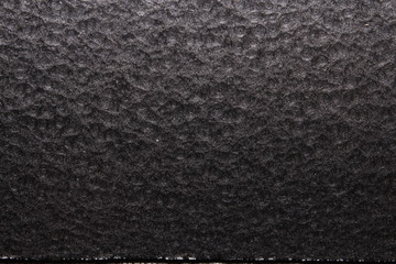 black hammered metal background,abstract metalic texture, sheet of metal surface painted with hammer paint