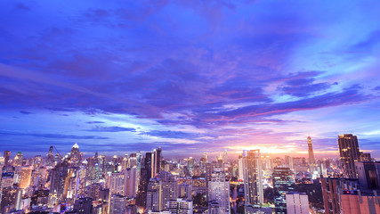 dramatic beautiful purple sky at sunset over cityscape