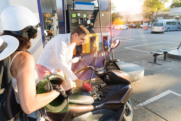 Man And Woman Motorcyclists Motorcycle On Station Young Couple Pertol Bike