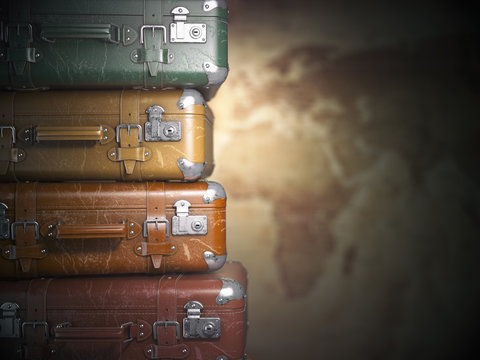 Vintage suitcases on the map background.Turism travel concept.