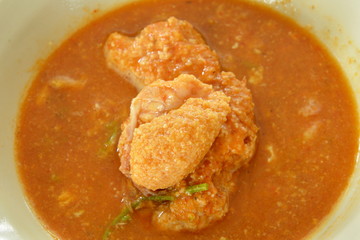 boiled fish egg in spicy and sour soup on bowl