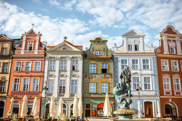 View on the beautiful old buildings with Neptune fountain on the Maket square in Poznan city during...