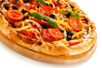 Pizza with ham and vegetables on white background 