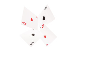 Playing cards flying at the white background