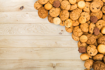 Cookies and biscuits at wood with copy space