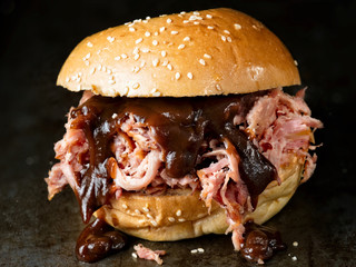 rustic american barbecued pulled pork sandwich