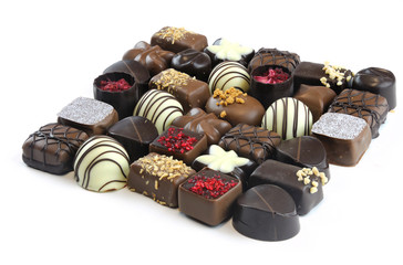 Various colorful chocolate isolated on white background