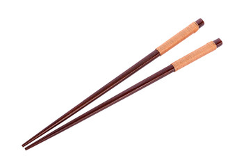 Wooden pairs of chopsticks on white background