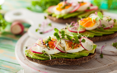 Open sandwiches with avocado and egg