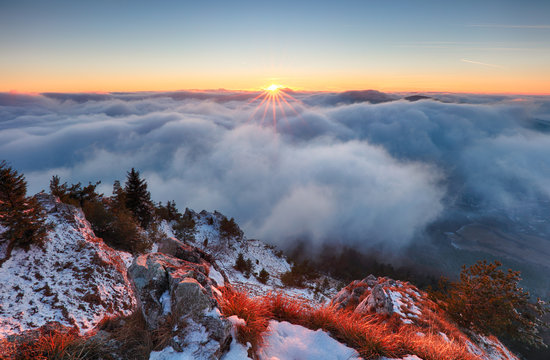 Fototapeta Above clouds in winter - mountain landcape at sunset, Slovakia