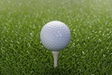 Golf ball on the green with copy space