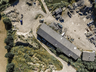 Warehouse and external storage at a concrete plant, aerial view