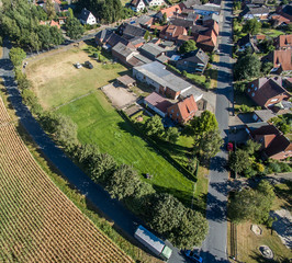 Meadow on the edge of a village, aerial view from Lower Saxony, Germany