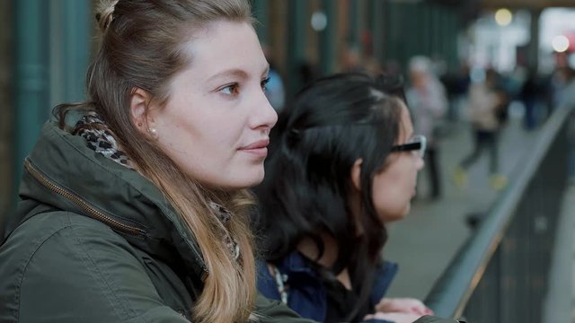 Two girls visit London and enjoy the trip and sightseeing