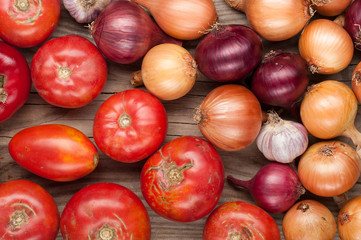 vegetables crop  on wooden background onions garlic, top view, copy space