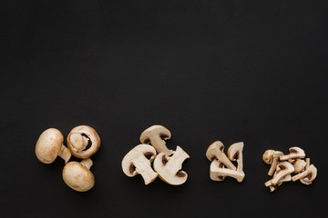 Stages of cutting mushrooms on black background