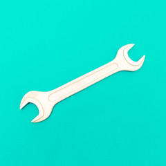 Wrench on a blue background Minimal art design