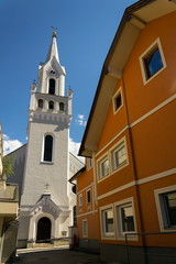 Fototapeta premium White Evangelic Church in Schladming city center, Austria