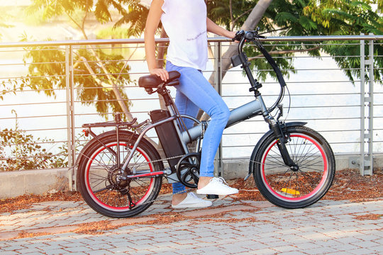 Women with electric ebike With lake view