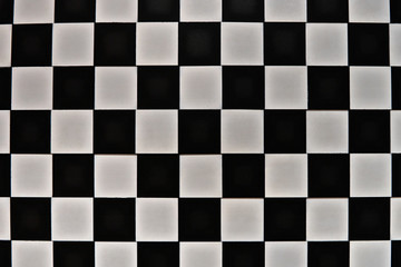 Black gray surface in a cage, like a chess board