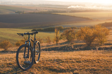 Naklejka premium Sunrise, sunset, Cycling around the world Is a journey to freedom.