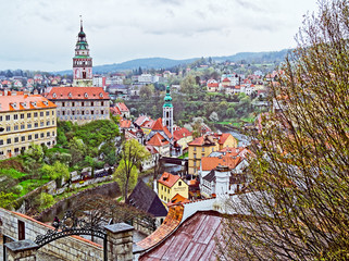 CZECH KRUMLOV, CZECH REPUBLIC - APRIL 17, 2017: View of the city in the spring. It's raining. The historical center of the city in 1992 is listed as a UNESCO World Heritage Site.