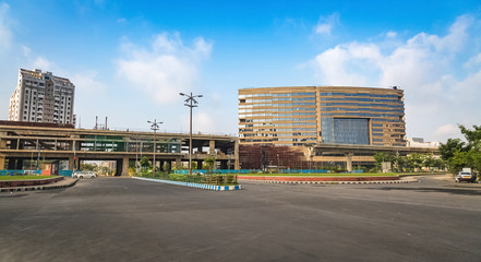 City industrial and commercial buildings with under construction over bridge. 