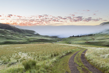Fototapeta premium Fog in the valley at sunrise