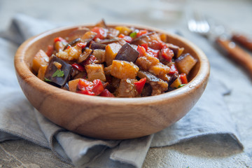 Eggplant stewed saute with fresh vegetables and herbs