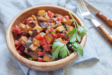 Eggplant stewed saute with fresh vegetables and herbs