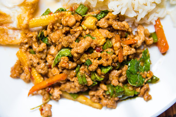 Rice topped with stir-fried pork and basil