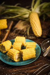 Cooked corn on the cob with salt and butter