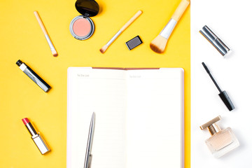 Fashion blogger objects flat lay. Blank open note book with to do list.
