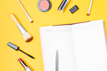 Fashion blogger objects flat lay. Beauty products, flowers and stylish female accessories on pastel background