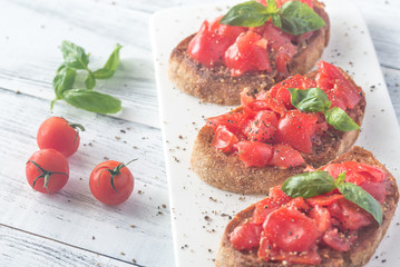 Bruschetta with cherry tomatoes and basil