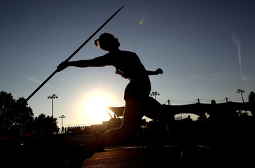 Woman throws javelin