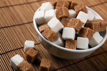 still life of cubes of white and brown sugar