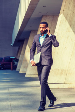 Young African American businessman traveling, working in New York