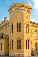 Fototapeta na wymiar Officer pavilion in Komarno (Komárom), Slovakia. Neo-Gothic style, reminiscent of English Gothic. Two-storey building with two polygonal towers on the main facade.