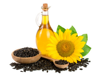 Sunflower oil, seeds and flower isolated on white background