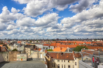 Fototapeta na wymiar Berlin, Germany, top view. Red roofs and beautiful sky