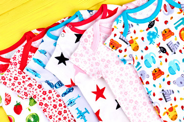Infants soft printed rompers. Babies new patterned bodysuits on sale. Newborn kids brand apparel collection.