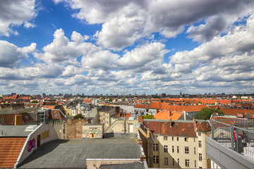 Naklejka na ściany i meble Berlin, Germany, top view. Red roofs and beautiful sky
