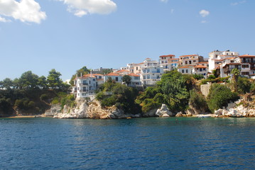 Skiathos town on Skiathos Island, Greece. Beautiful view of the old town with boats in the harbor.