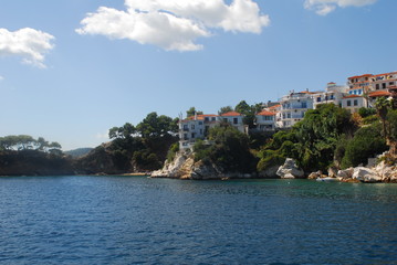 Skiathos town on Skiathos Island, Greece. Beautiful view of the old town with boats in the harbor.